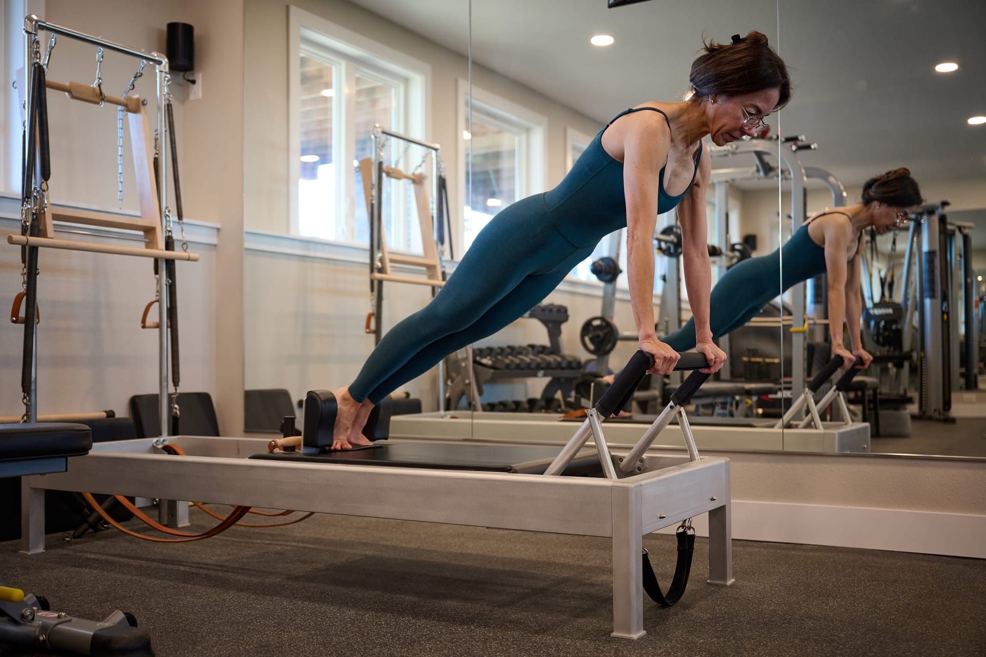 Private Pilates training session on Reformer