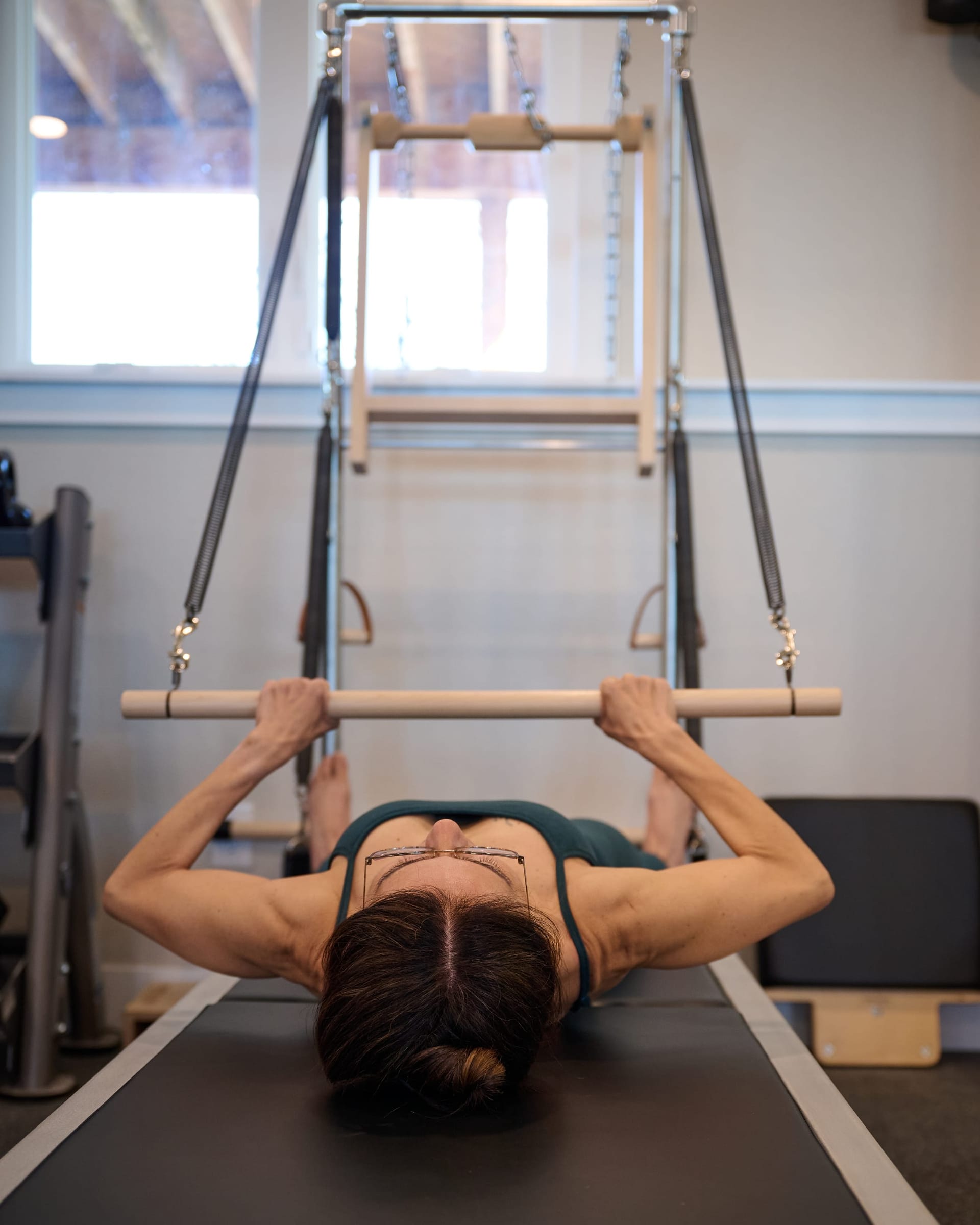 Tower exercise with spring resistance for upper body training